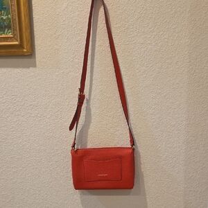 Nanette Lepore Bold Red Crossbody Bag with Gold Plated Zip and Its Logo
